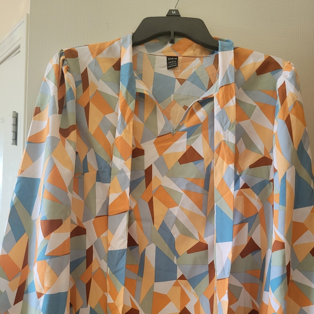 Beautiful geometric colorful blouse!
